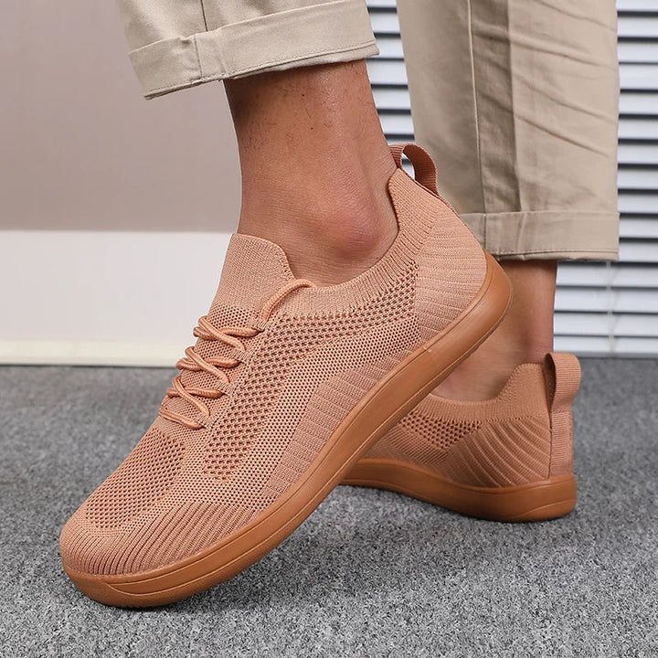 Orangefarbene Herrenschuhe, leicht & atmungsaktiv, weite Zehenbox, gepolstert für Komfort.