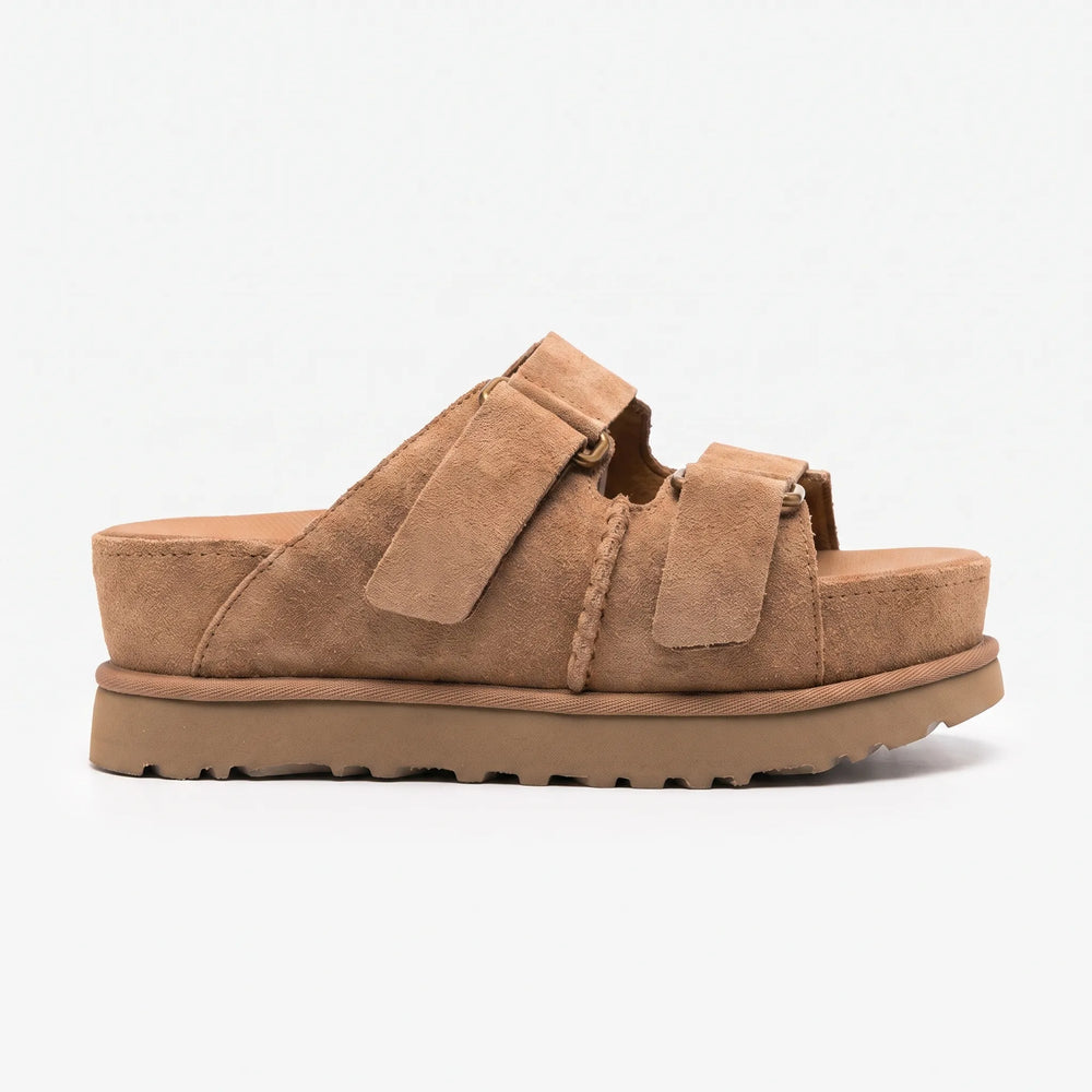Modische Slip-on Plateau Pantoletten für Damen. Sommerschuhe mit chunky Sohle und verstellbaren Riemen.