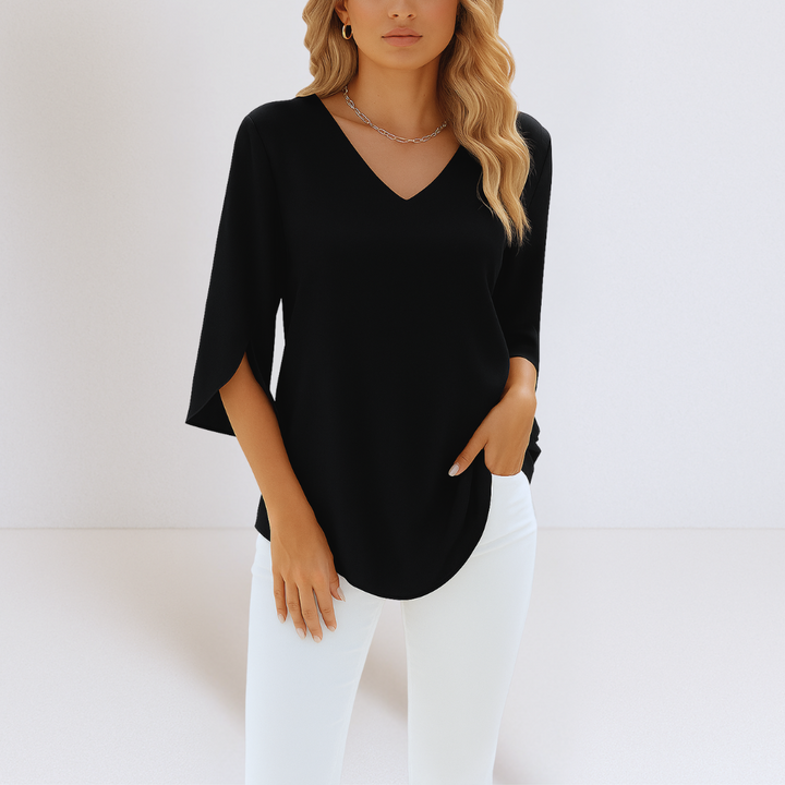Feminine Damenbluse in Schwarz, elegant mit V-Ausschnitt & geschlitzten Ärmeln. Luftig & bequem für den Sommer.