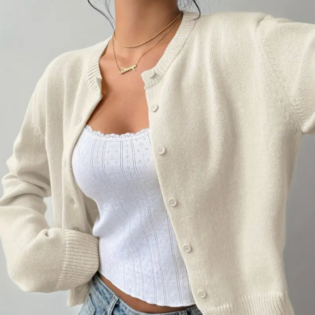 Taillenkurzer Damen Cardigan, vielseitig kombinierbar, ideal für frühlingshafte Outfits.