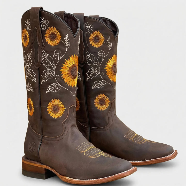 Bequeme Damen Westernstiefel Yvette mit stylischer Sonnenblumenapplikation; perfekt für den Boho- oder Festival-Look.