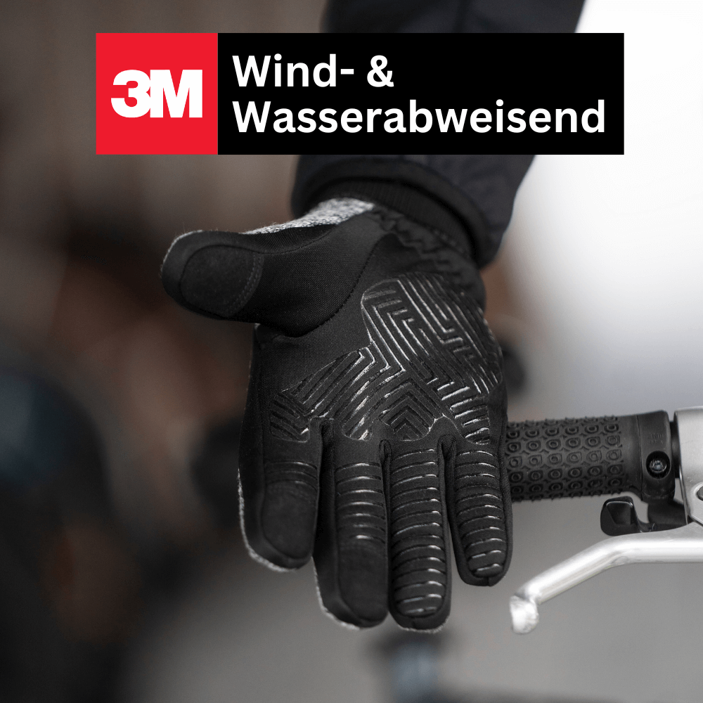 Person bedient Smartphone mit ThermoFit Touchscreen-Handschuhen, beweist Funktionalität im Winter.