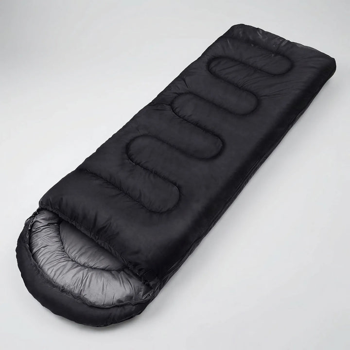 Vielseitiger 4-Jahreszeiten Deckenschlafsack: warm, leicht & wasserdicht für Camping, Wandern & Outdoor-Reisen.