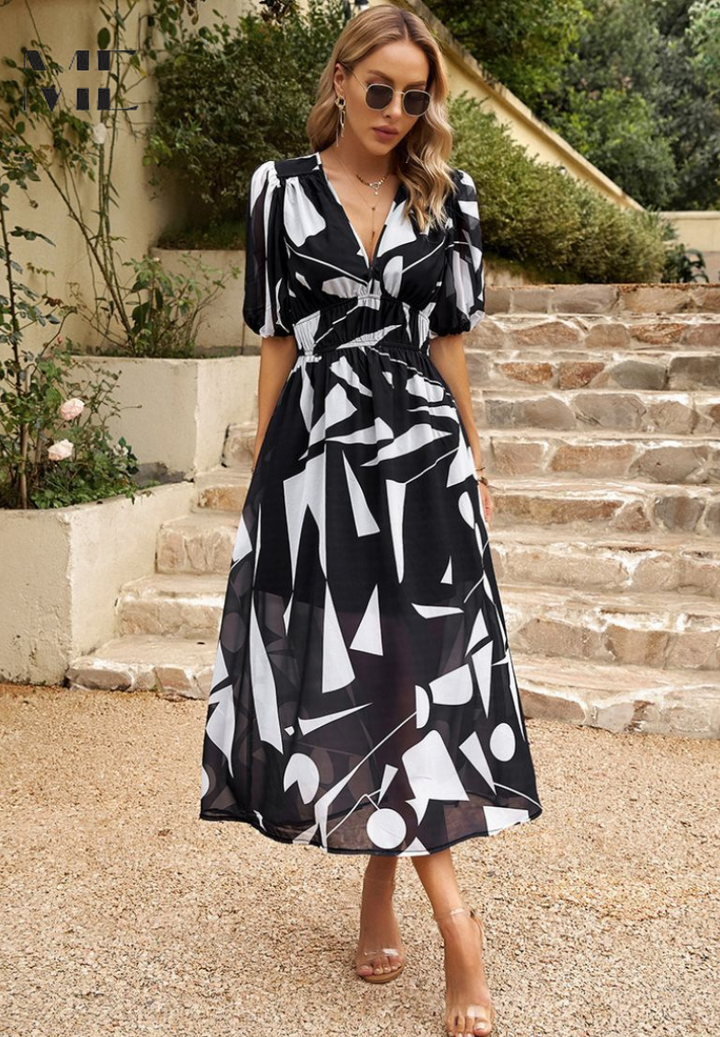 Perfektes Damenkleid für den Sommer: Blumen Midi, V-Ausschnitt, Puffärmel, leicht und schick.