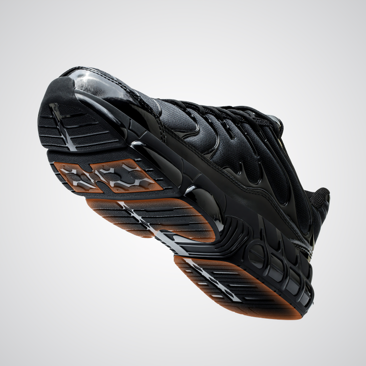 Robuste Herren Arbeitsschuhe mit Stahlkappe, sportlicher Sneaker-Stil, schwarzes Obermaterial, Schnürverschluss.