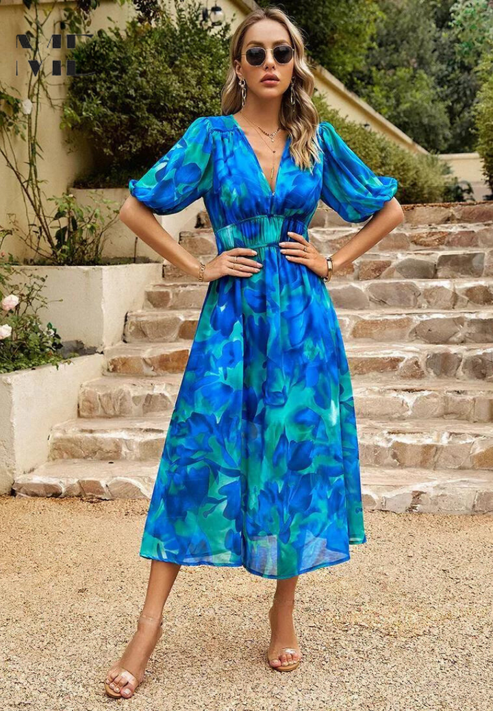 Damen Sommer Midi Blumenkleid, V-Ausschnitt, Puffärmel, betont die feminine Silhouette elegant.