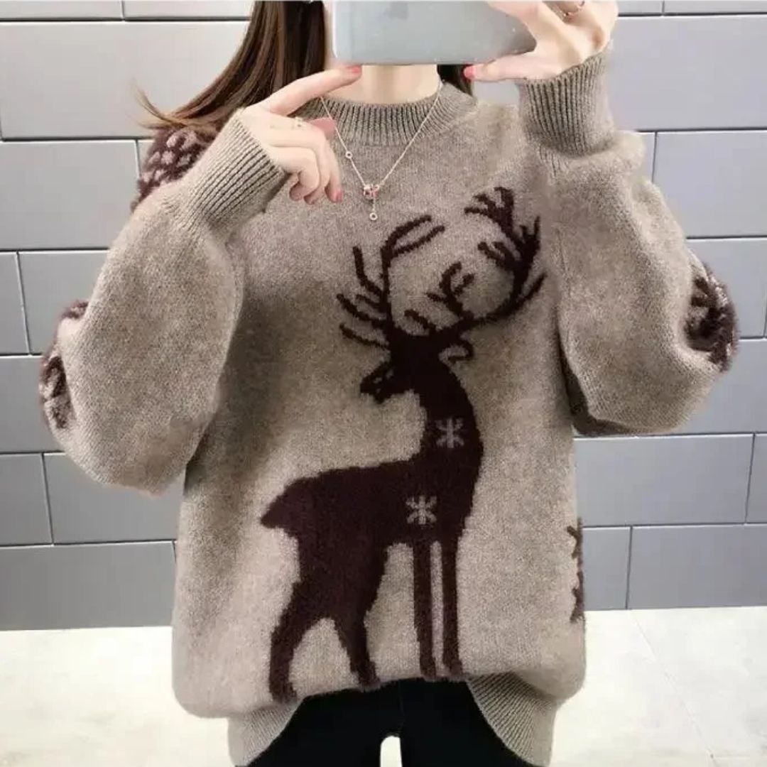 Damen Weihnachtspullover mit festlichem Rentiermotiv in Rosa, Braun und Weiß; gemütliche Wintermode für Damen.