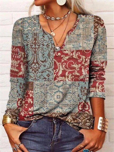 Modische Damen Boho-Bluse mit V-Ausschnitt, weiten Glockenärmeln & einzigartigem Ornamentprint für Herbst-Looks.