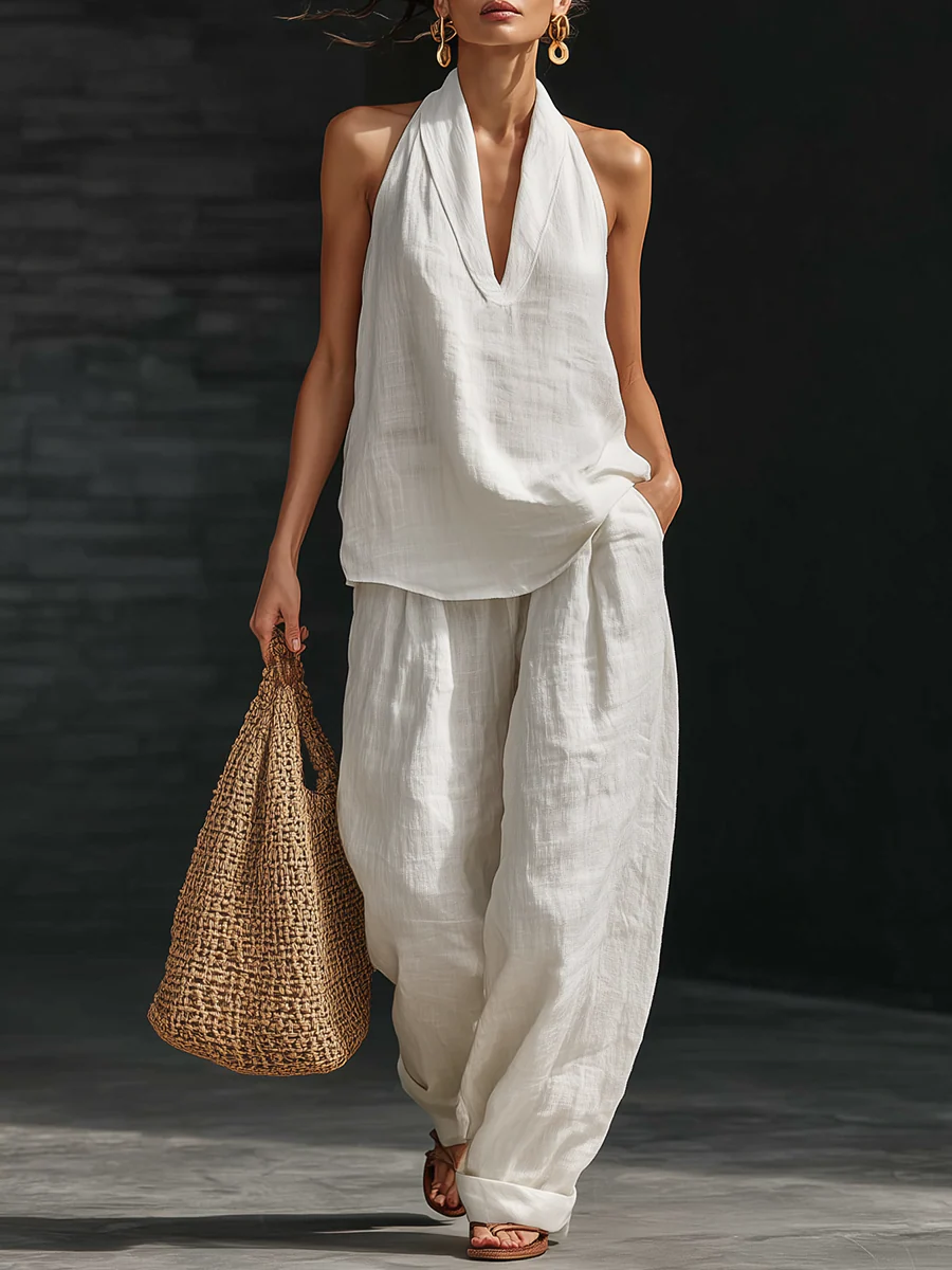 Elegantes weißes Damen Sommer Zweiteiler Set: bequemes Top & weite Hose. Perfekt für Freizeit & stilvolle Auftritte.