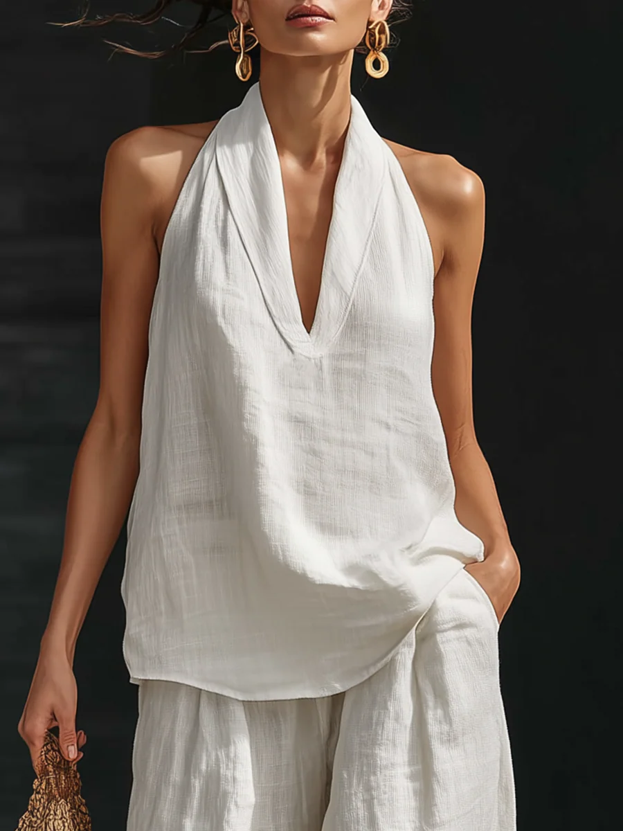 Bequeme weiße weite Hose des Damen Sommer Zweiteiler Sets. Hoher Tragekomfort für warme Sommertage.
