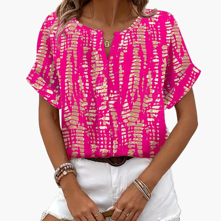 Business-taugliche Damen Kurzarmbluse mit modernem Print für einen professionellen Look.