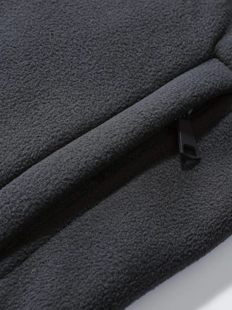 Moderne Herren Thermofleecejacke in Grau. Leichte, wärmende Outdoorjacke für Herbst & Winter.