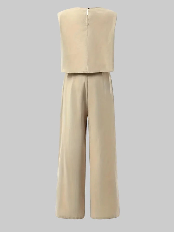 Eleganter Damen Leinen Zweiteiler: Ärmellose Bluse und fließende Leinenhose, ein Must-have für sommerliche Outfits.