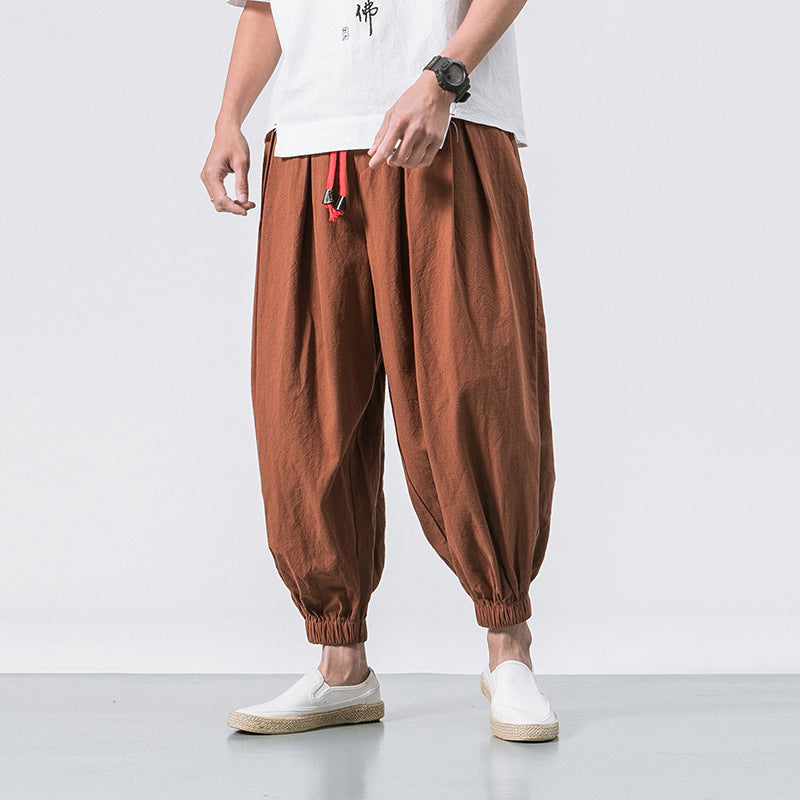 Lässige Herren Haremshose für Streetwear, locker sitzend, bequem, mit Kordelzug und modernen Bündchen.