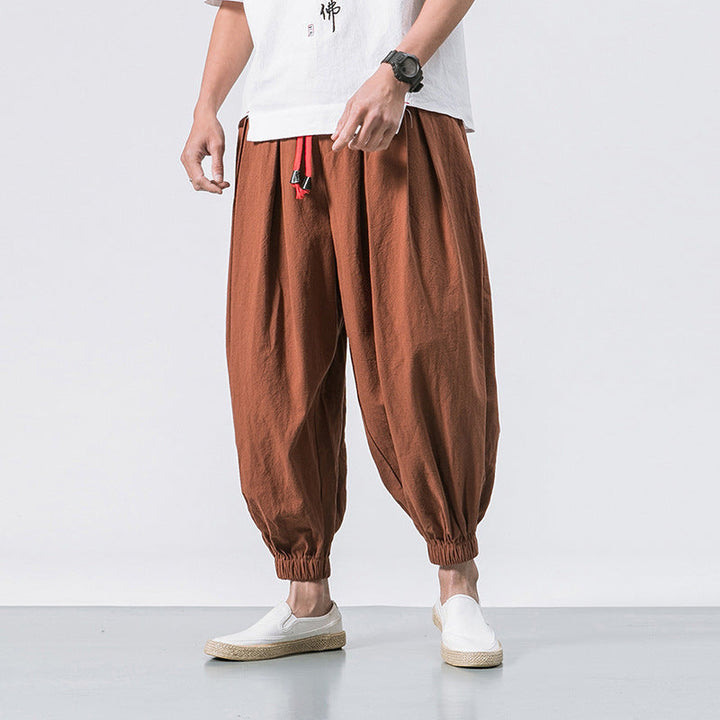 Lässige Herren Haremshose für Streetwear, locker sitzend, bequem, mit Kordelzug und modernen Bündchen.
