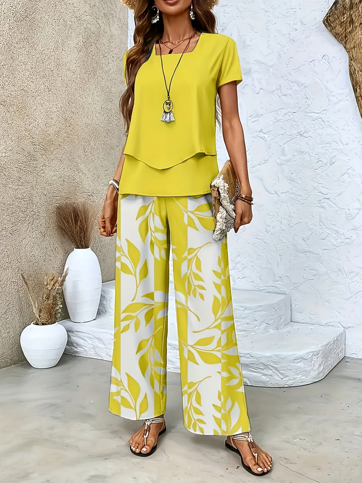 Elegantes Damen Freizeit Set: Fließende weite Hose & Kurzarmshirt, ideal für warme Sommertage.