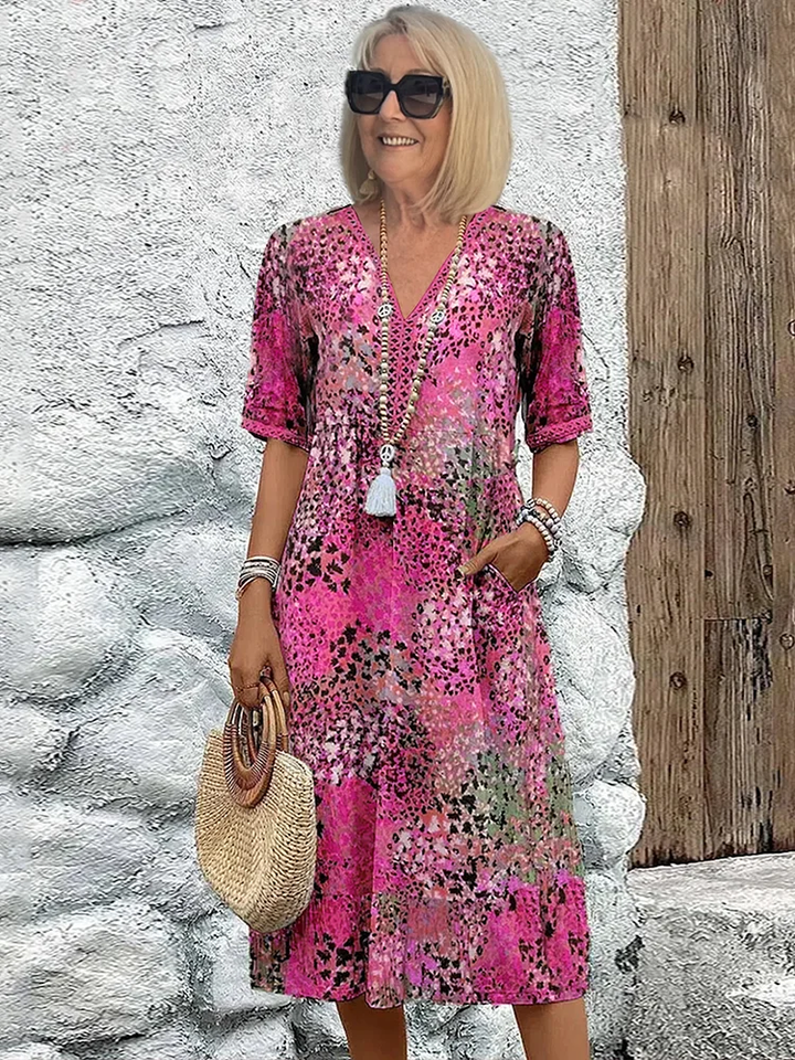 Bequemes Damen A-Linien Midikleid mit Blumenprint und V-Ausschnitt; ideal für Freizeit.