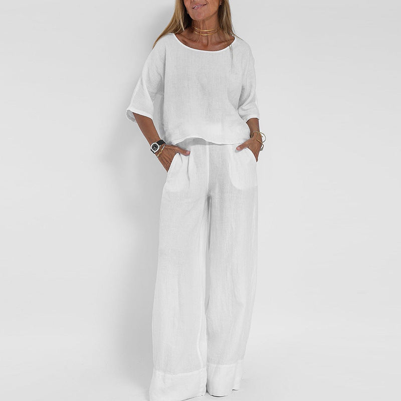 Vielseitiges Damen Set: Lockeres Halbarm Top und weite Hose als moderner Zweiteiler für einen stylischen Sommer.