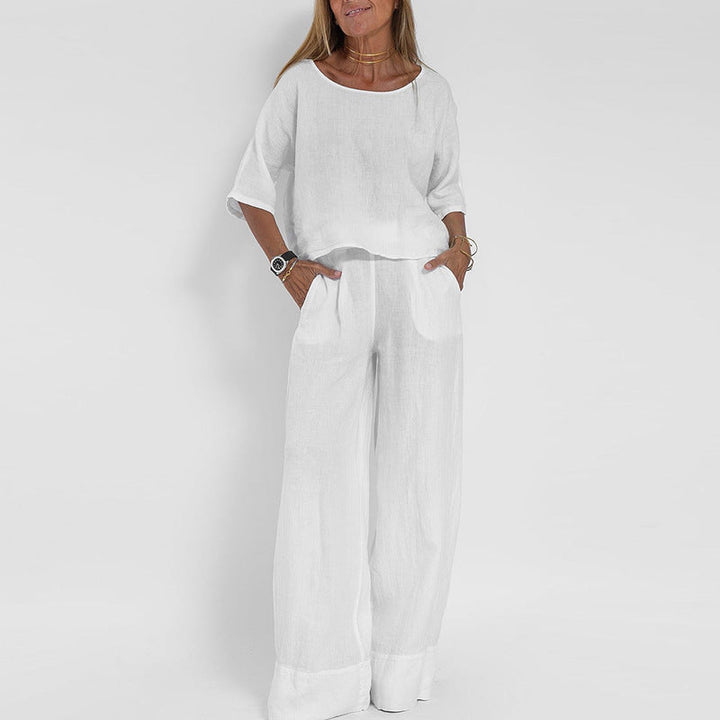 Vielseitiges Damen Set: Lockeres Halbarm Top und weite Hose als moderner Zweiteiler für einen stylischen Sommer.