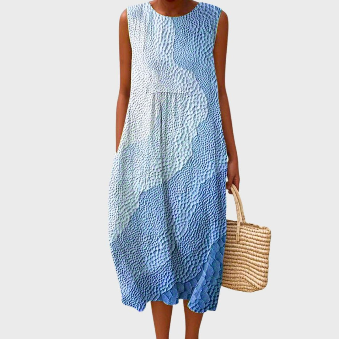 Elegantes blaues Damen Midikleid, ärmelloses Sommerkleid mit fließendem Stufenrock. Ideal für warme Tage & Urlaub.