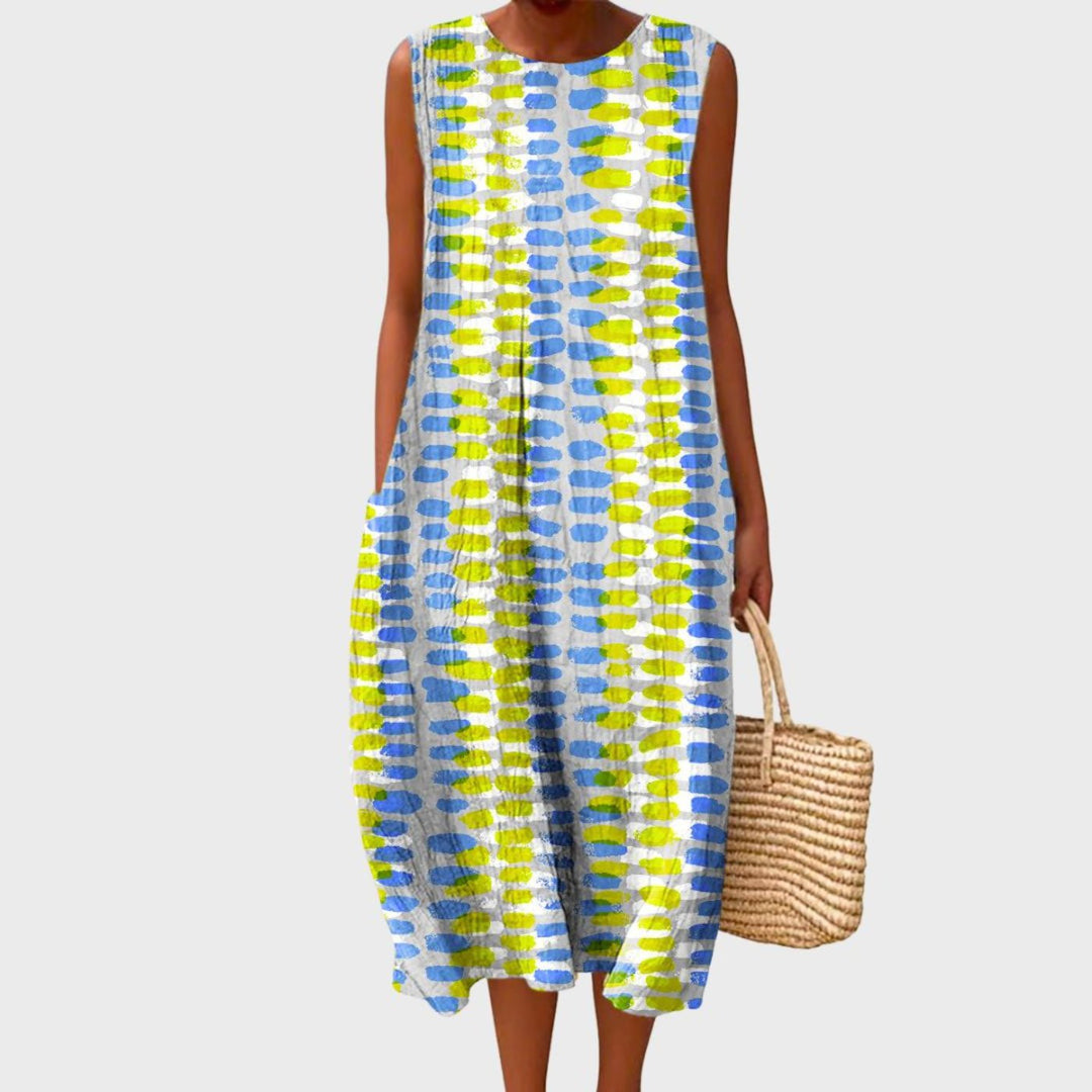 Vielseitiges blaues Damen Midikleid. Ärmelloses, komfortables Stufenkleid, perfekt als Freizeit-, Urlaubs- oder Alltagskleid.