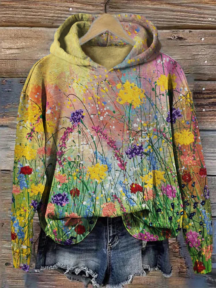 Unisex Hoodie mit lebhaftem Blumenprint und künstlerischem Design für bequeme Freizeit-Streetwear.