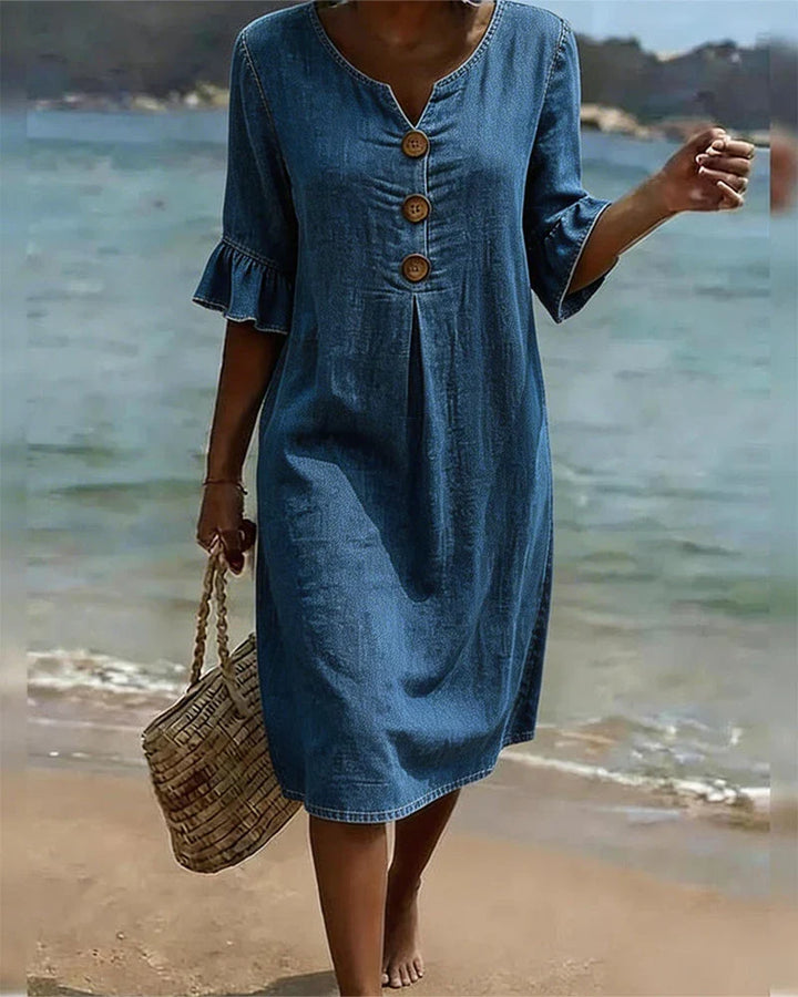 Locker sitzendes Damen Midi Sommerkleid mit Knopfleiste, Rundhals & Halbarm. Bequemes, stilvolles Freizeitkleid.
