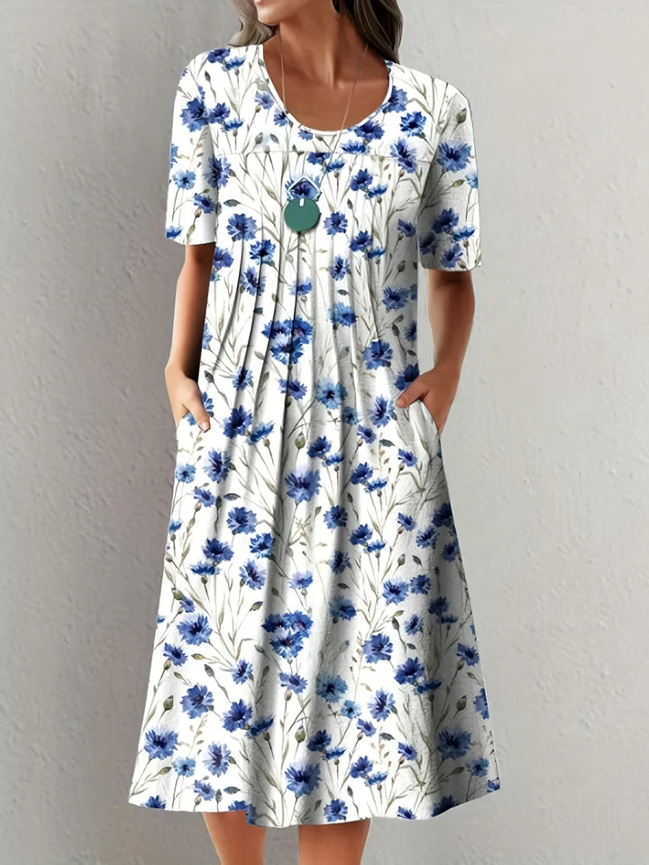 Damen Blumen Kurzarmkleid, festlich & elegant. Perfekt für den Sommer, Gartenpartys und als Freizeitkleid.