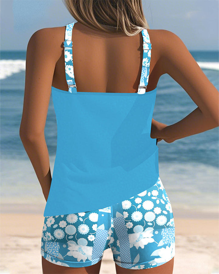 Zweiteiliger Damen Tankini mit Blumenmuster. Sommerliche Badebekleidung für Schwimmen & Entspannung.