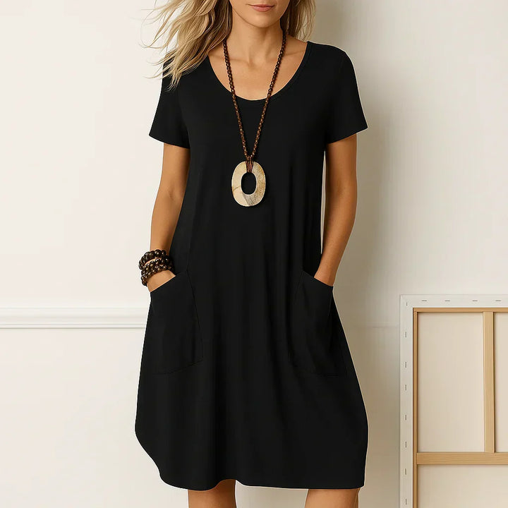 Vielseitiges Damen Sommer Midikleid, kurzarm, im Boho-Look mit Taschen. Bequem als Freizeit- oder elegantes Strandkleid.