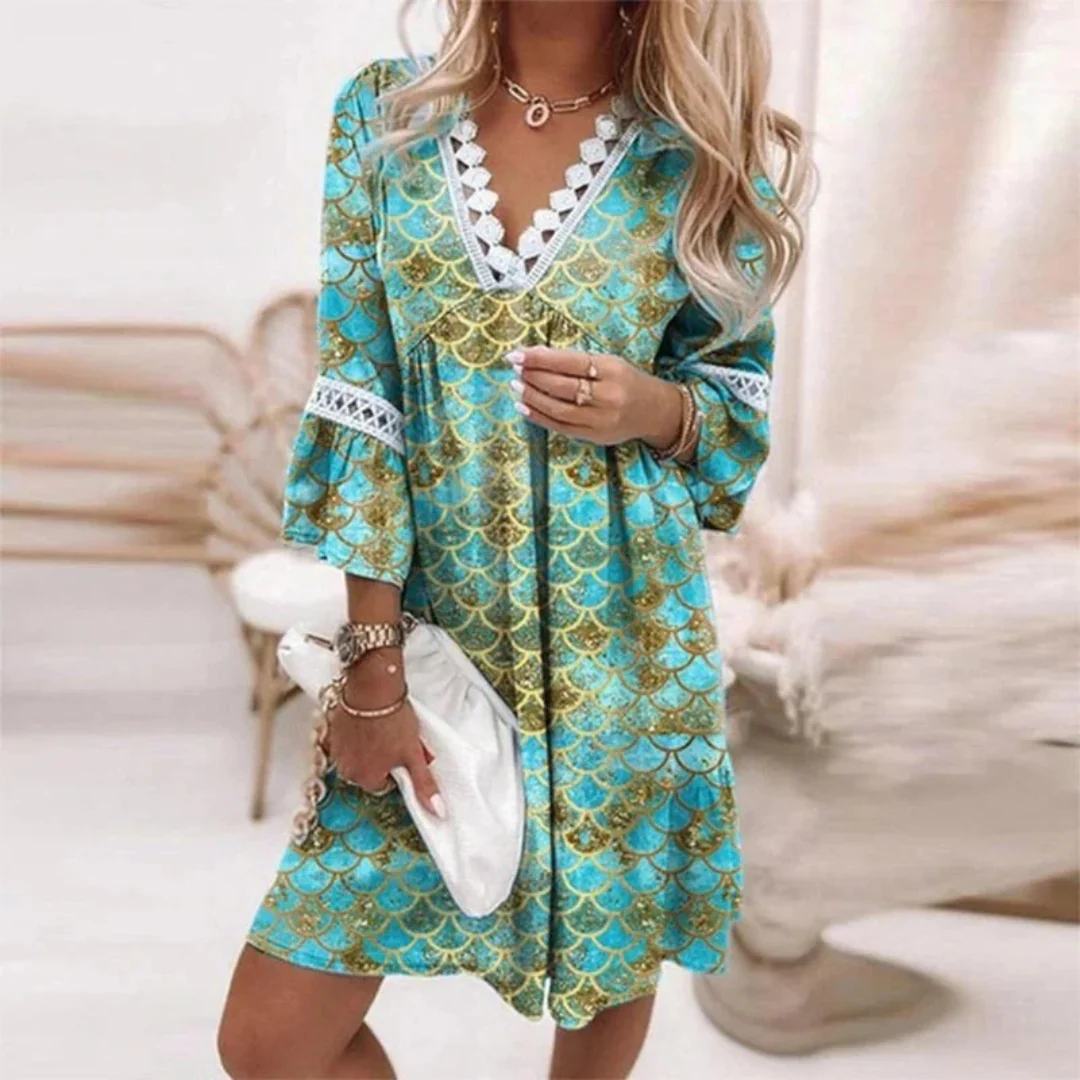 Bequemes Damen Midikleid mit V-Ausschnitt und feinem Paisleymuster. Luftiges Sommer-Bohokleid mit Spitze für elegante Frauen.