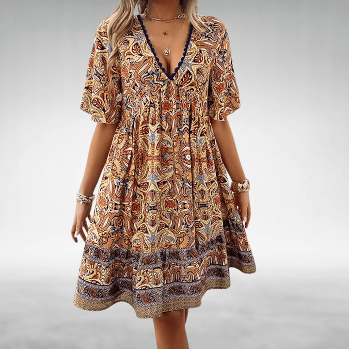 Damen V-Ausschnitt Midikleid mit elastischem Saum & Kurzarm. Ein bequemes und luftiges Freizeitkleid im Boho-Stil.