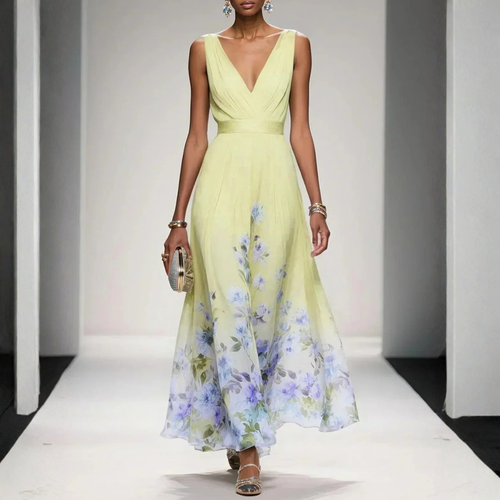 Langes, fließendes Damen Sommerkleid mit floralem Muster. Ideal als elegantes Hochzeitsgastkleid.