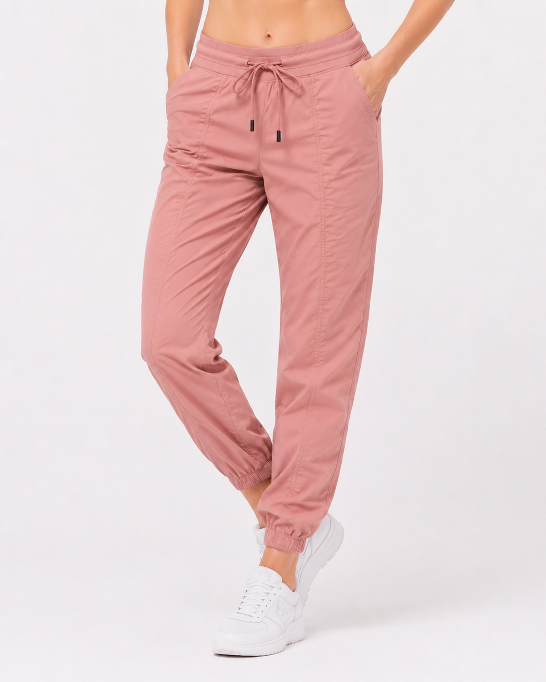 Vielseitige Damen Fitnesshose aus dehnbarem, schnelltrocknendem Stoff für Yoga & Freizeit.