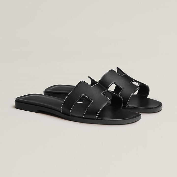 Elegante & bequeme Damen Flache Sandalen mit feinem Cut-out Muster und rutschfester Sohle.