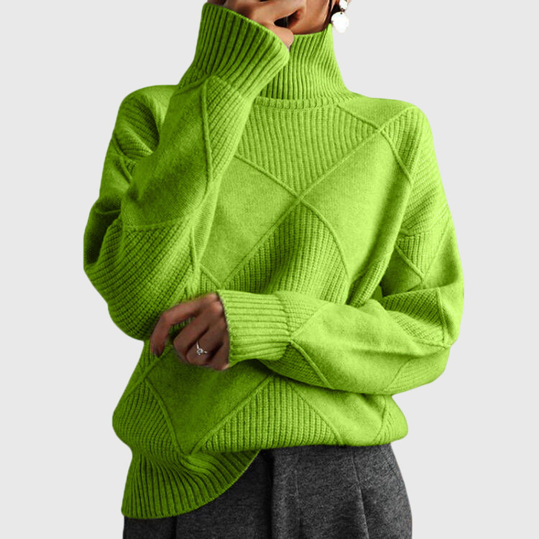 Moderner Damen Rollkragenpullover, geometrisch gemustert, eleganter Strick für stilvolle Herbstmode.