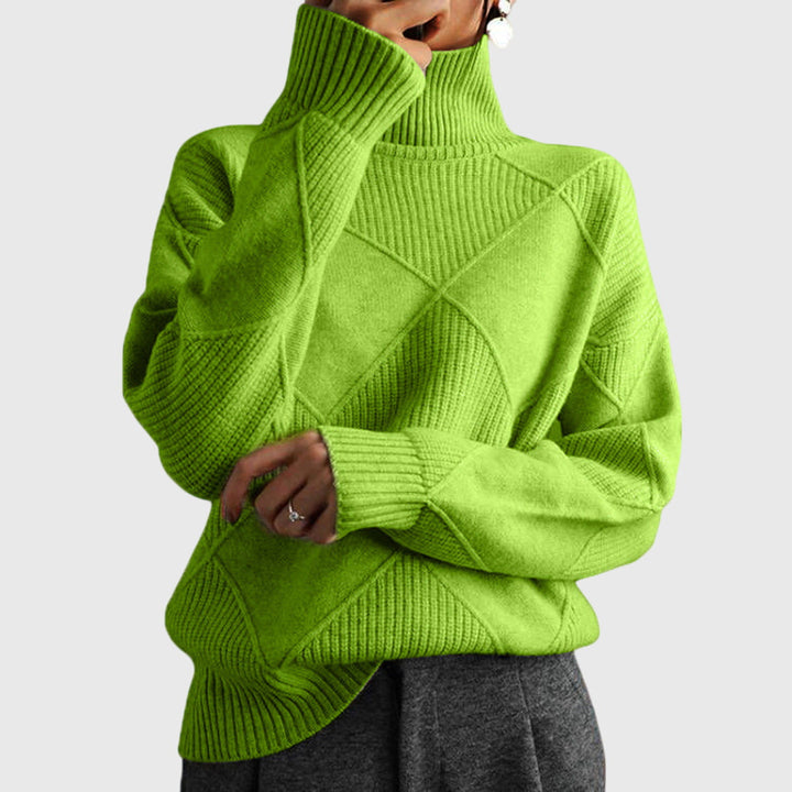 Moderner Damen Rollkragenpullover, geometrisch gemustert, eleganter Strick für stilvolle Herbstmode.