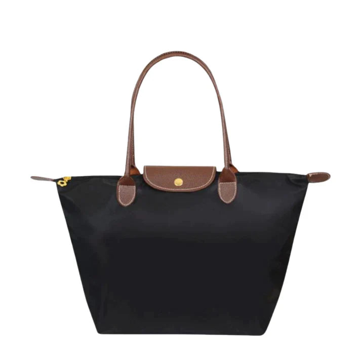 Damen Handtasche aus Kunstleder, elegant & stilvoll für den Alltag. Geräumige Schultertasche mit Organisation.