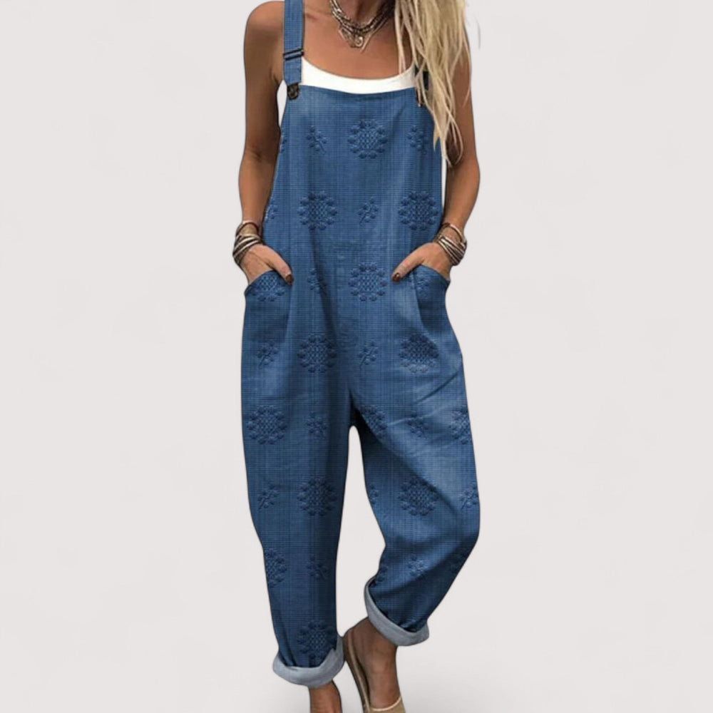 Modischer Damen Sommer Jumpsuit mit weitem Schnitt, lockerer Passform und Taschen für Freizeit und Entspannung.