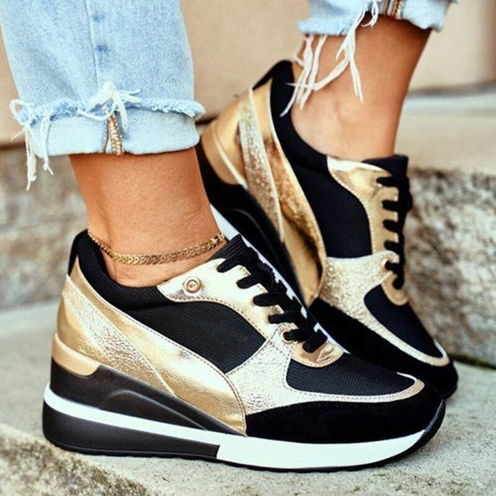 Damen Komfort-Sneaker in Schwarz mit orthopädischen Sohlen für gesunde Füße und bequemes Gehen.