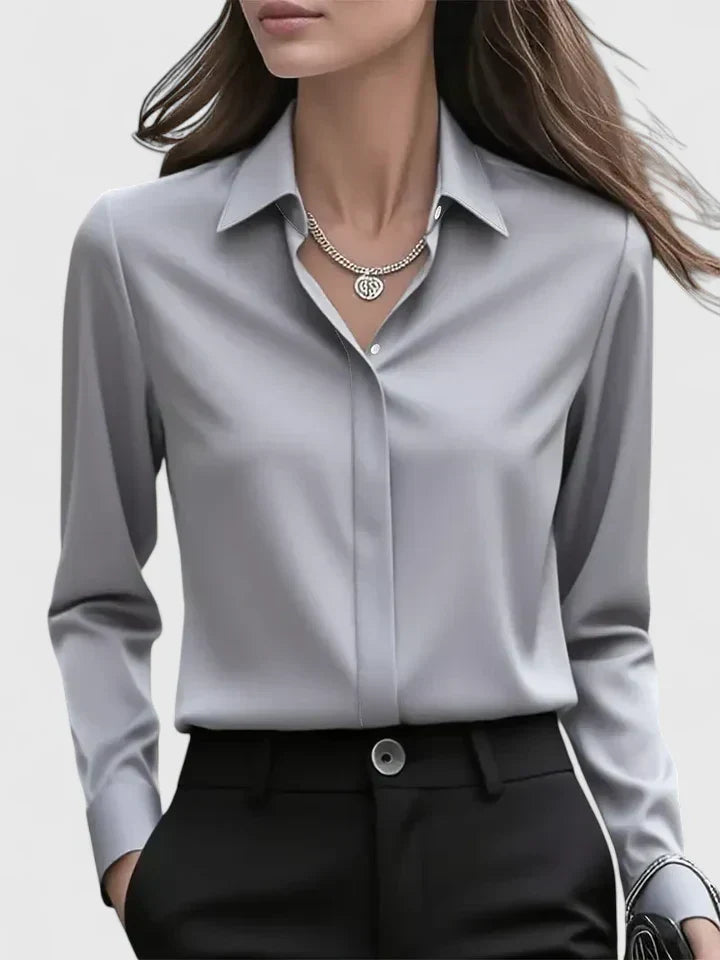 Schickes Damen Langarmshirt, unifarben, ideal für Büro & Abend, mit verdeckter Knopfleiste und abgerundetem Saum.