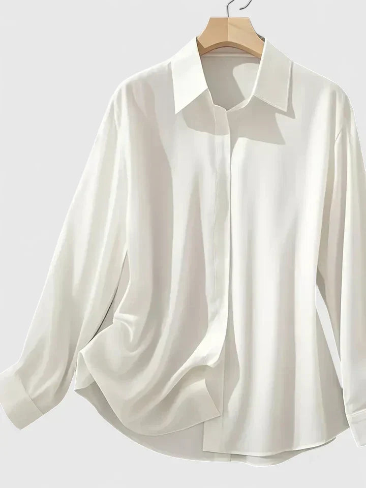 Modernes Damen Langarmshirt, vielseitig für Business und Freizeit, mit stilvoller verdeckter Knopfleiste.