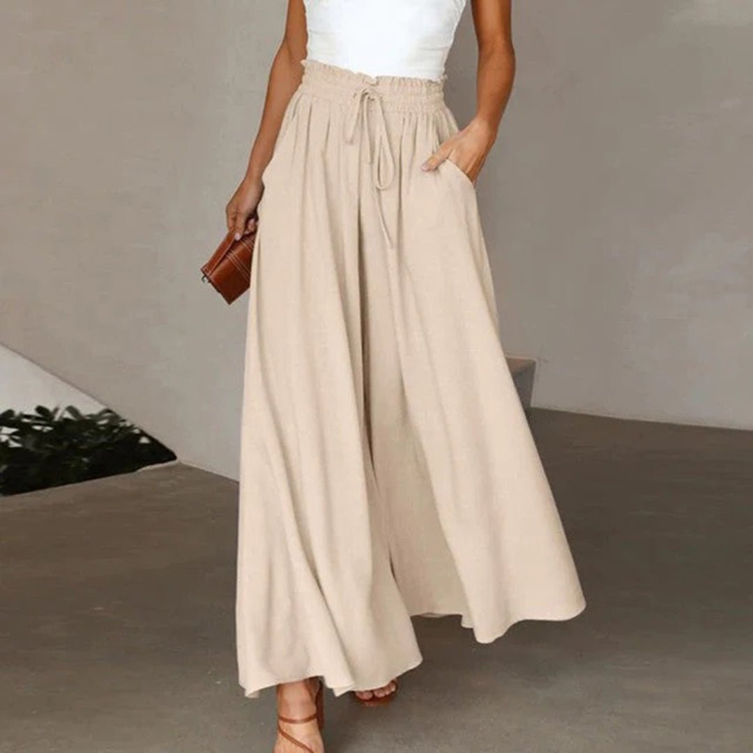 Elegante Damen-Hose, weites Bein, hoher Bund, in Dunkelblau, perfekt für einen stilvollen Auftritt.