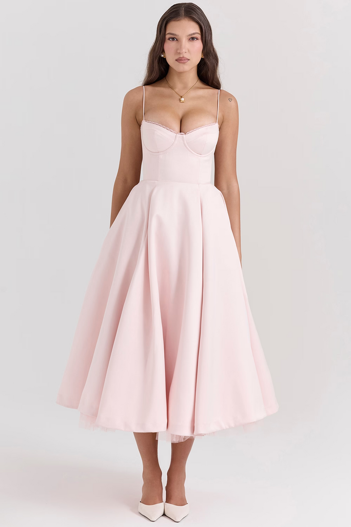 Bezauberndes Midi-Kleid für Frauen, mit Korsett-Top und fließendem Rock. Ideal als Cocktailkleid.