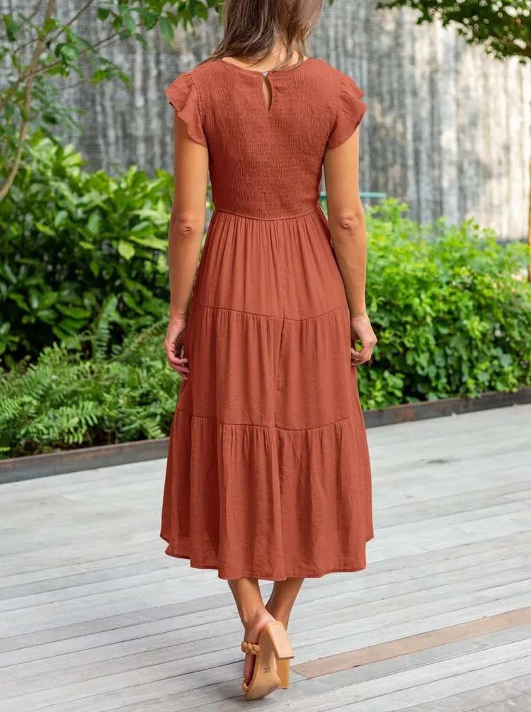 Leichtes Damen Midikleid mit Rüschenärmeln, ideal als lässiges Sommerkleid oder elegantes Tagesoutfit.