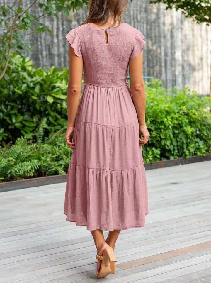 Lässiges und schickes Damen Midikleid mit Rüschenärmeln und Rundhals, ideal für Frühling/Sommer.