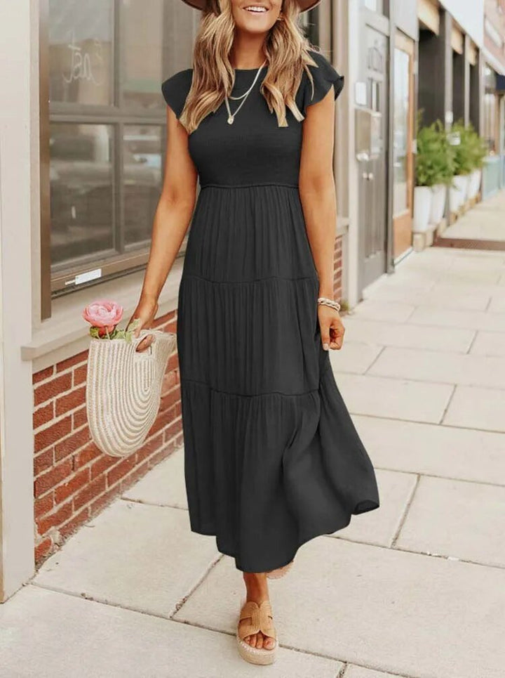 Elegantes Damen Midikleid mit femininen Rüschenärmeln, ideal für Sommer und Freizeit.