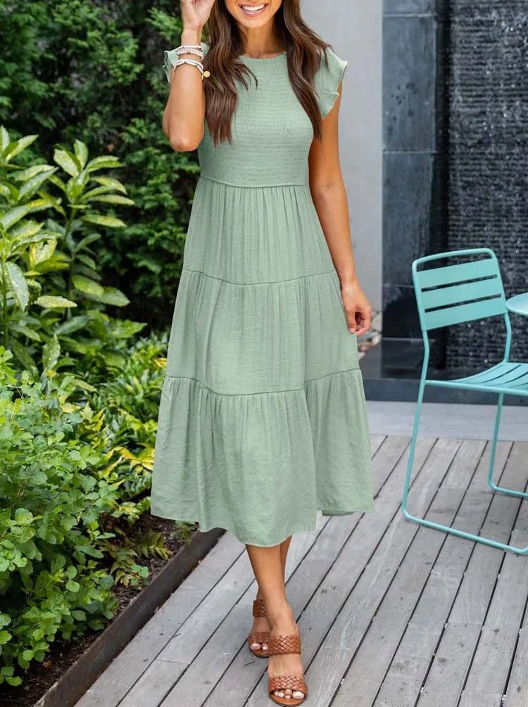 Stylisches Damen Midikleid mit Rundhals, Rüschenärmeln und gestuftem Rock – lässig & elegant.
