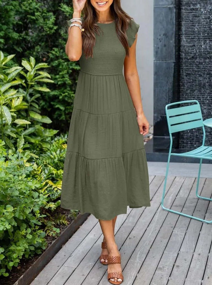 Feminines Damen Midikleid mit eleganten Rüschenärmeln, gestuft und vielseitig kombinierbar.