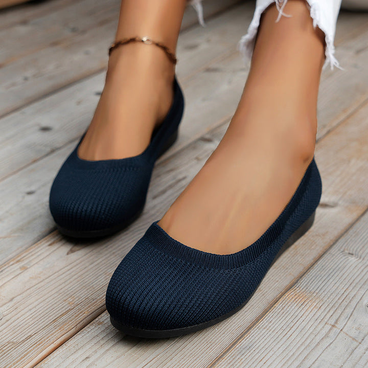 Damen Orthopädische Slipper, Seitenansicht, zeigen das bequeme Design und die Sohle.